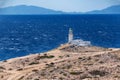 White lighthouse in Prasonisi National Park Ã¢â¬â southest spot of Island Rhodes, Greece Royalty Free Stock Photo